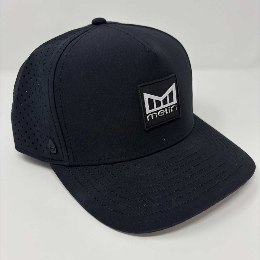 Melin Black Odyssey Stacked Hydro Performance Snapback Hat Classic Fit Logo Cap